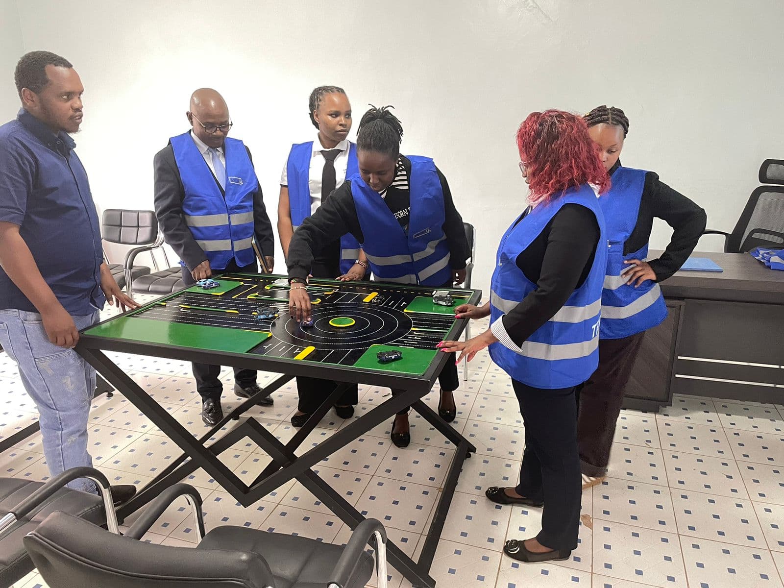 ARUSi instructor guiding a student through practical car control.